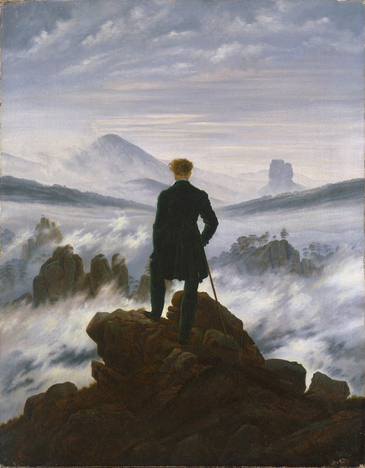 The Wanderer above the Mists by Caspar David Friedrich showing a lone figure on a rocky peak overlooking misty mountains Romantic landscape art print.