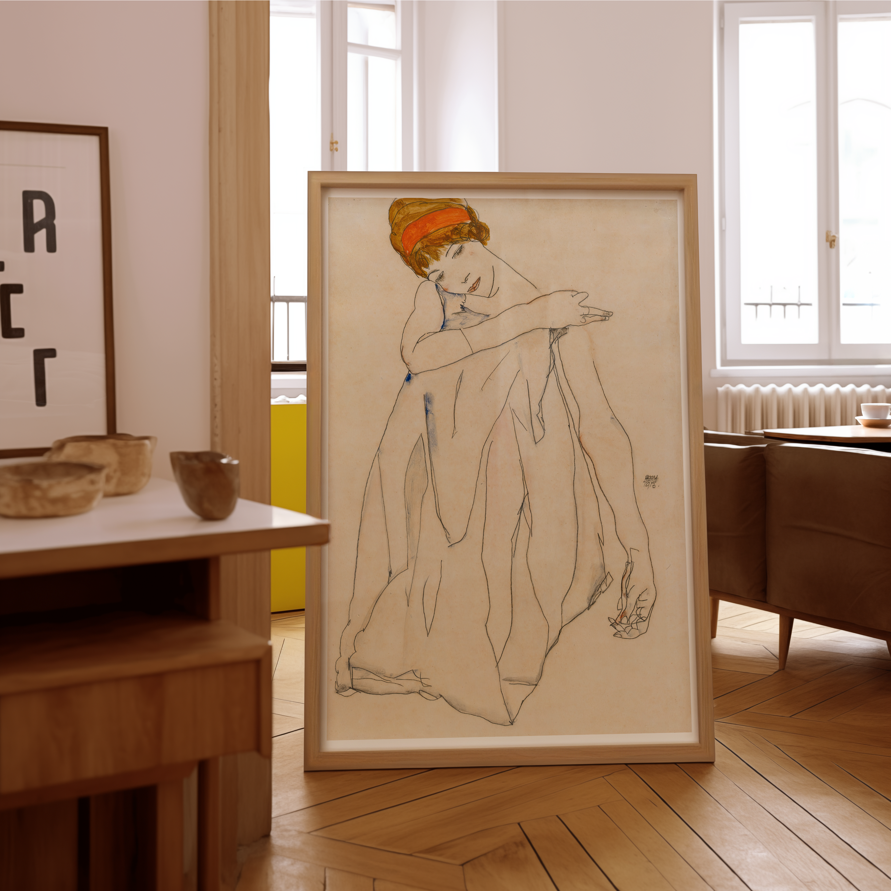 Framed artwork of a nude figure in a room with wooden floors and furniture. QUIPHAM COLLECTON ART PRINT POSTER WALL ART